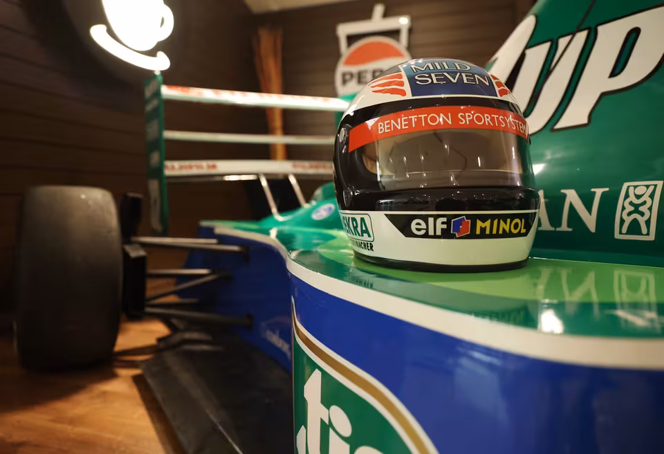 Racing helmet resting on the Jordan 191